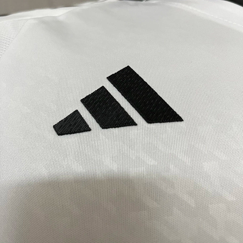 CAMISETA REAL MADRID I + PARCHES 24/25 HOMBRE (VERSIÓN JUGADOR)